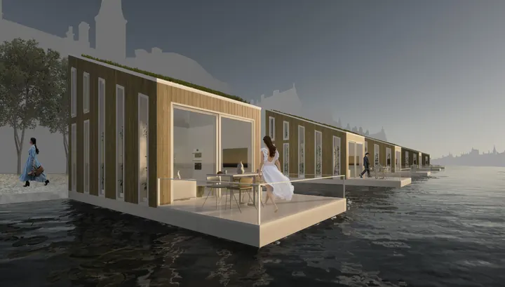 A row of timber-clad floating homes on dark water at dusk, a woman on a terrace and a city skyline behind