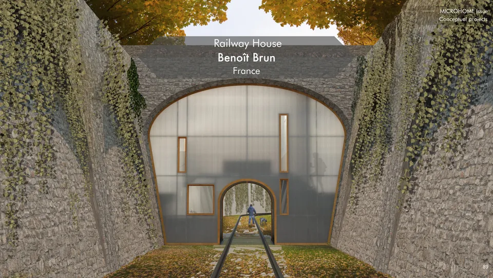 A glass home fitted into the stone arch of an old railway bridge, ivy on the walls either side