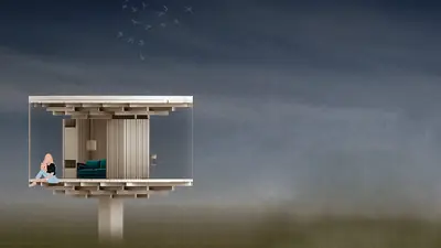 A small house raised on one post in the evening mist, someone sitting at its open edge