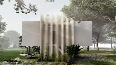A box behind tall timber slats, raised above the grass among misty trees