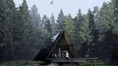 A black A-frame cabin lit from inside in a dark pine forest