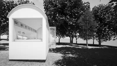 A black and white render of a small white house with a vaulted roof among trees