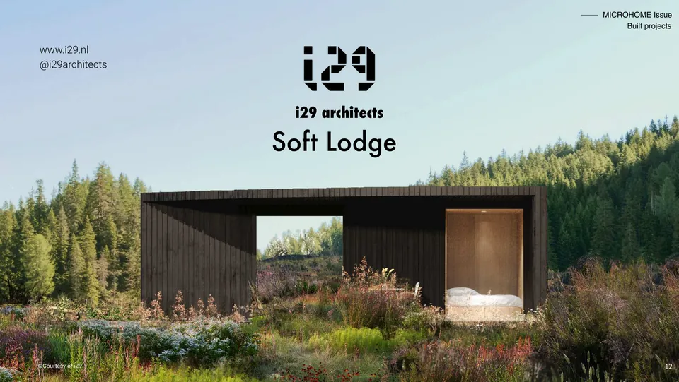 Soft Lodge: a long black timber lodge in a meadow of tall flowers, the i29 name above it