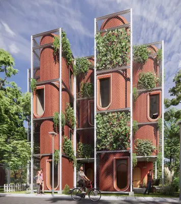 Tall narrow towers of red brick and green frames, full of plants, a cyclist in the street below