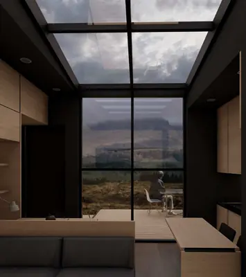 A dark timber room with a glass roof and a tall window onto a grassy plain and mountains