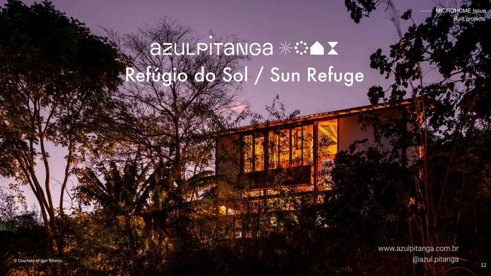 Sun Refuge: the house lit up at dusk among trees, the Azul Pitanga name above it