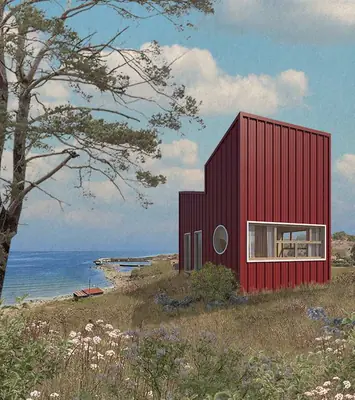 A red timber house with a big window on a grassy shore by the sea